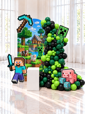 Décoration d'anniversaire thème jeu de blocs, backdrop imprimé, guirlande de ballons verts et noirs et découpes de personnages