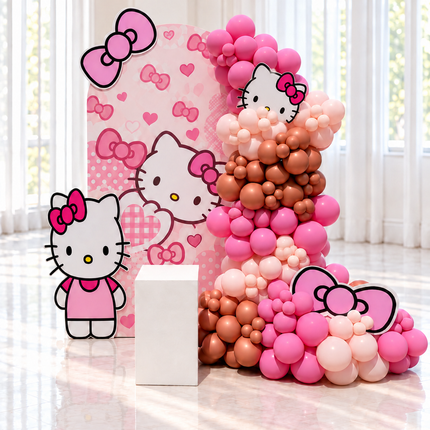 Décoration d'anniversaire pour fille thème chatonne et boucles, backdrop rose et guirlande de ballons roses et caramel