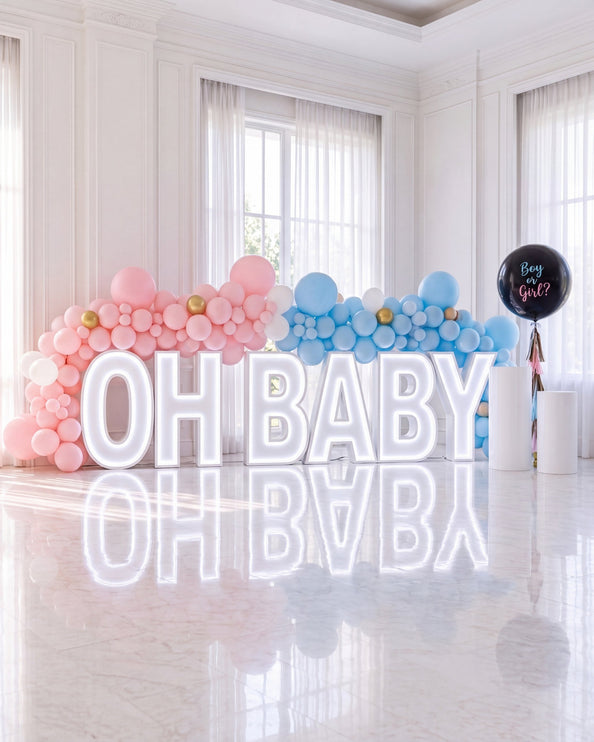 Lettres lumineuses OH BABY rose et bleu pour un gender reveal
